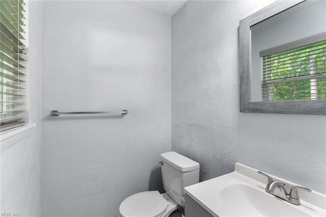 2050 Midway Ave, Chesapeake, VA 23324 - half bathroom featuring toilet and vanity
