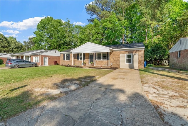 2050 Midway Ave, Chesapeake, VA 23324 - ranch-style house with brick siding, a front lawn, driveway, and a porch