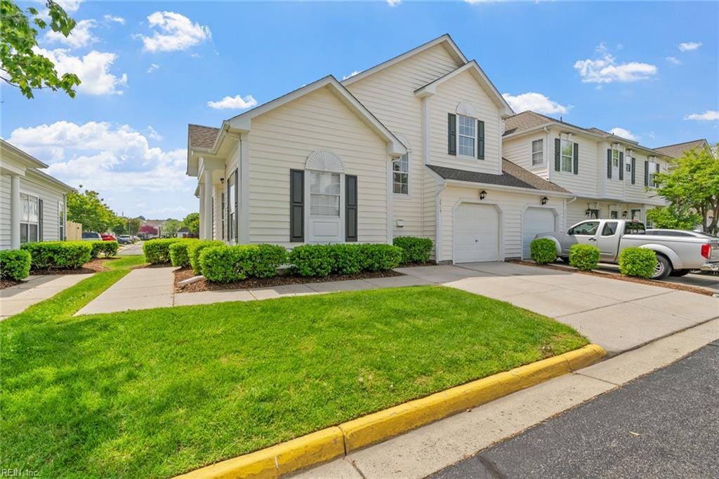 2513 Covent Garden Rd, Virginia Beach, VA 23456 - view of front of property with an attached garage, driveway, and a front yard