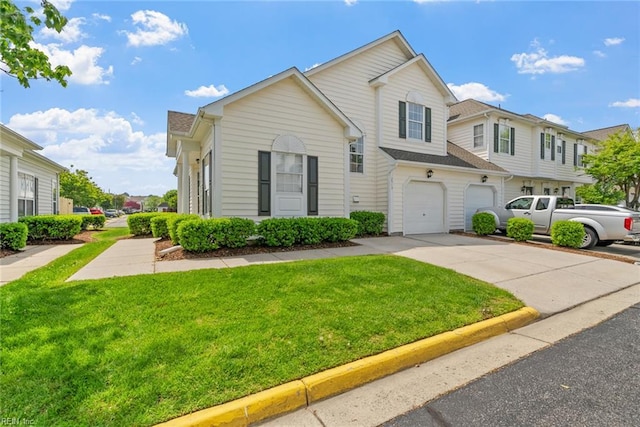 2513 Covent Garden Rd, Virginia Beach, VA 23456 - view of front of property with an attached garage, driveway, and a front yard