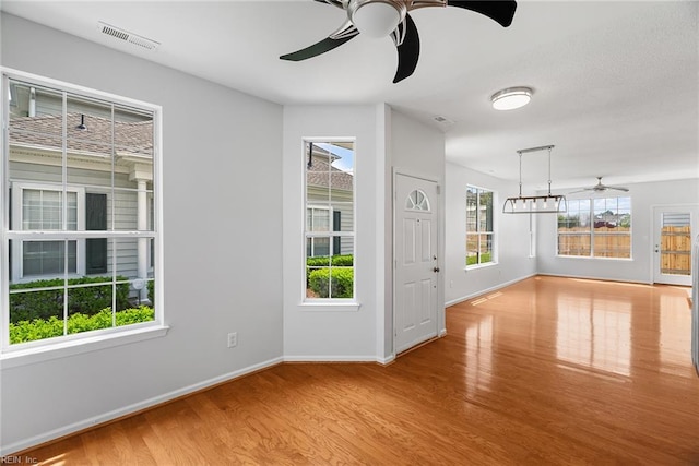2513 Covent Garden Rd, Virginia Beach, VA 23456 - interior space featuring visible vents, baseboards, ceiling fan, and wood finished floors