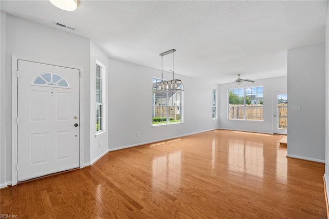 2513 Covent Garden Rd, Virginia Beach, VA 23456 - entryway with a ceiling fan, a textured ceiling, visible vents, wood finished floors, and baseboards