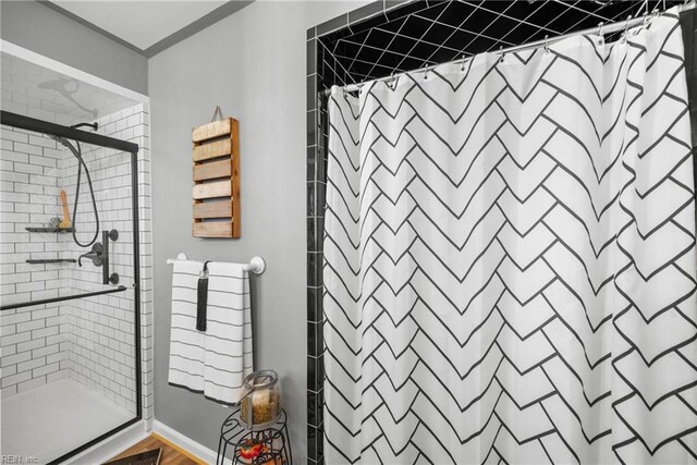 bathroom featuring a shower stall