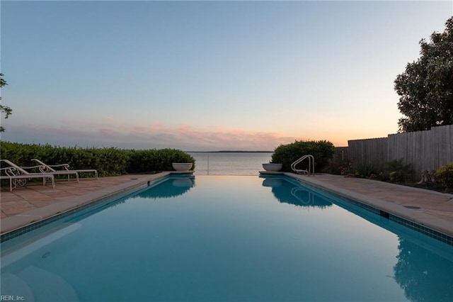 view of pool featuring a patio, fence, and a fenced in pool