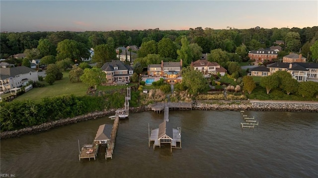 aerial view featuring a residential view and a water view