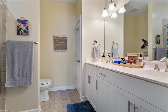 bathroom with a sink, baseboards, a chandelier, and visible vents
