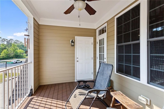 balcony featuring a ceiling fan