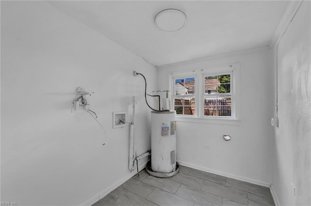 37 Farragut St, Portsmouth, VA 23702 - laundry area with laundry area, baseboards, and electric water heater