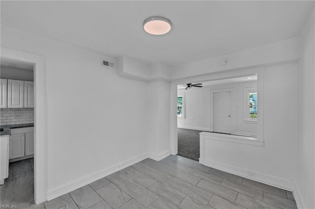37 Farragut St, Portsmouth, VA 23702 - spare room featuring baseboards, ceiling fan, and visible vents