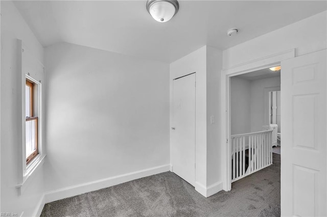 37 Farragut St, Portsmouth, VA 23702 - carpeted empty room featuring baseboards and lofted ceiling