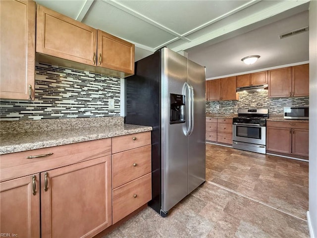2015 Neville Cir, Hampton, VA 23663 - kitchen featuring appliances with stainless steel finishes, light stone counters, tasteful backsplash, under cabinet range hood, and visible vents