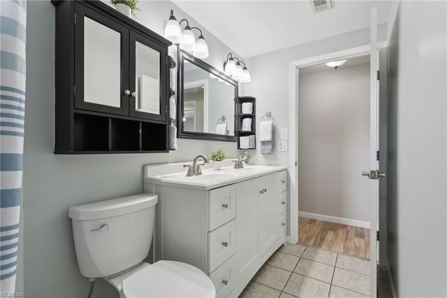 2015 Neville Cir, Hampton, VA 23663 - full bath featuring toilet, visible vents, a sink, and tile patterned flooring