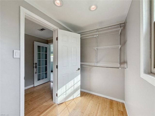2015 Neville Cir, Hampton, VA 23663 - walk in closet with visible vents and wood finished floors