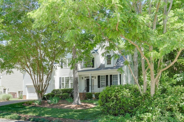 view of front of house with covered porch and an attached garage