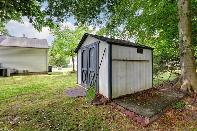 view of shed featuring central air condition unit