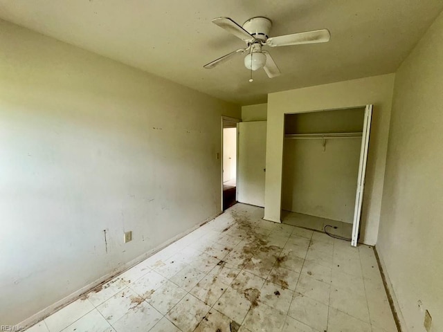 1528 Darren Cir, Portsmouth, VA 23701 - unfurnished bedroom with tile patterned floors, ceiling fan, and a closet