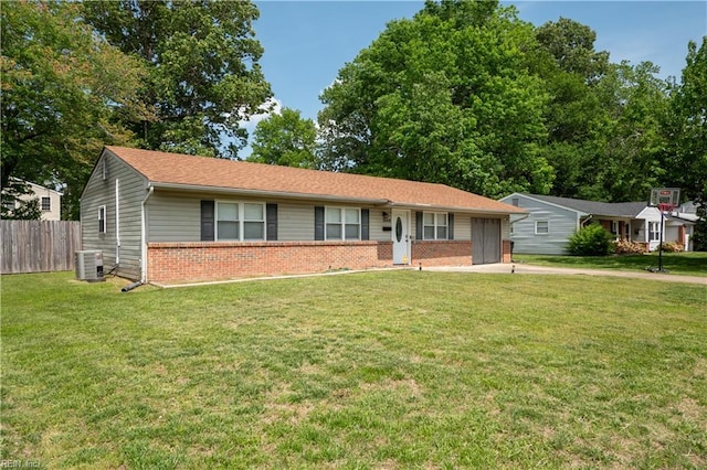 ranch-style house featuring a front yard, brick siding, central AC, fence, and an attached garage