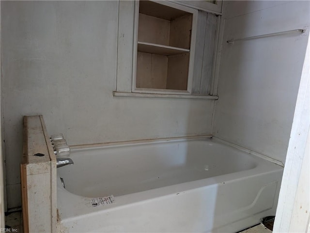 bathroom featuring a washtub