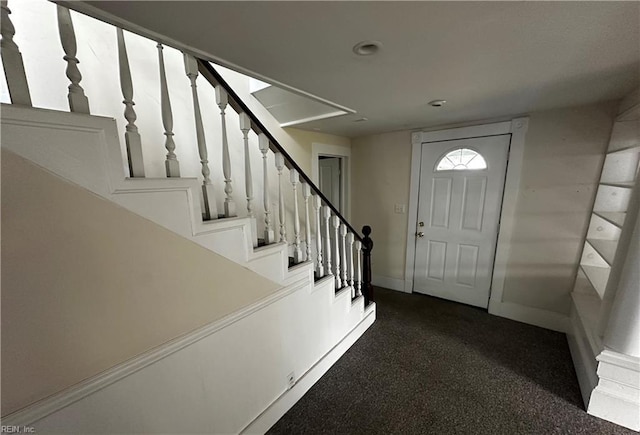 entryway featuring recessed lighting, baseboards, and stairway
