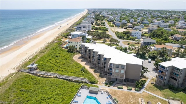 117 Sea Colony Dr Unit D227, Kitty Hawk, NC 27949 - drone / aerial view featuring a water view and a beach view