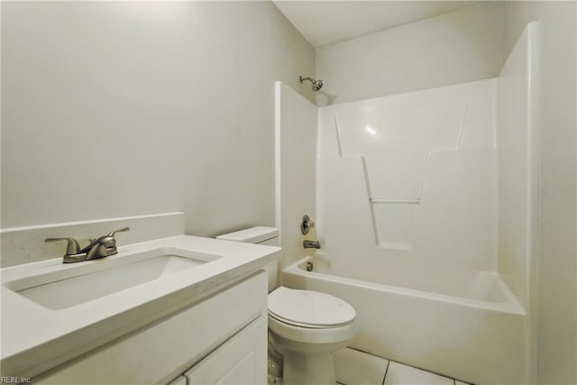 bathroom featuring tile patterned flooring, bathing tub / shower combination, toilet, and vanity