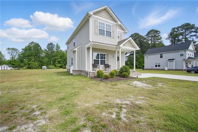 view of front facade with a porch and a front yard