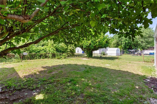 view of yard featuring fence