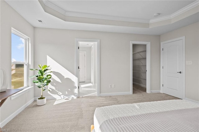 carpeted bedroom featuring baseboards and ornamental molding