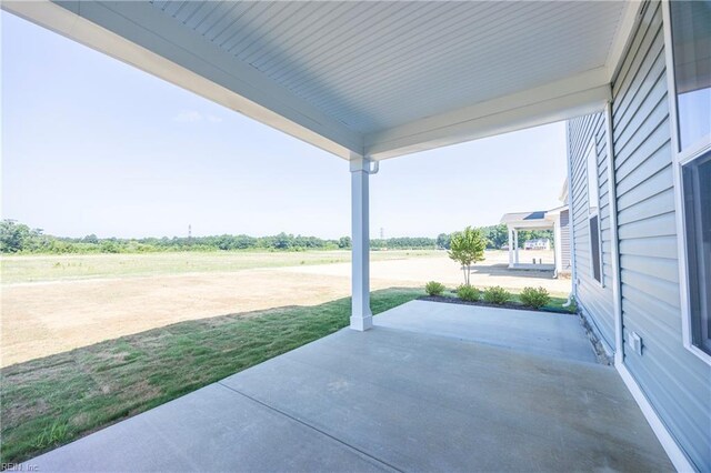 view of patio / terrace featuring a rural view