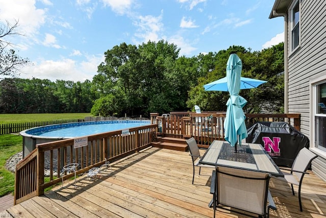 deck with an outdoor pool