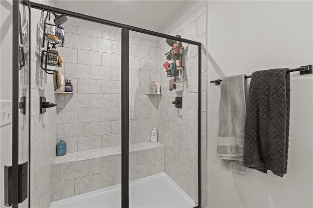 full bathroom with a shower stall