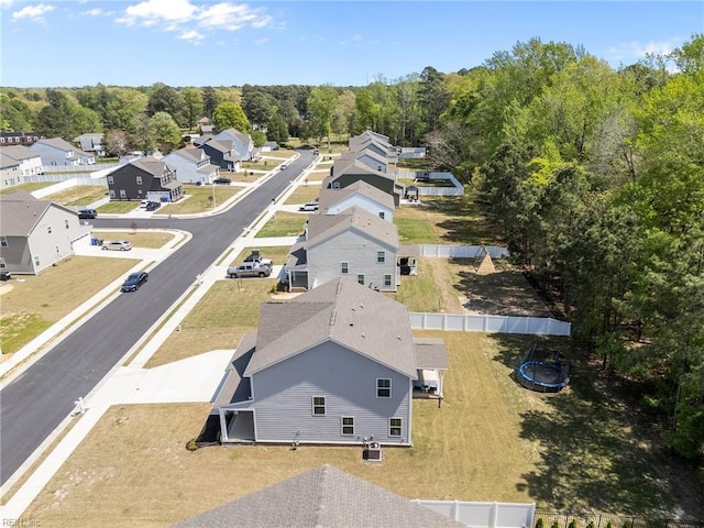 birds eye view of property with a residential view