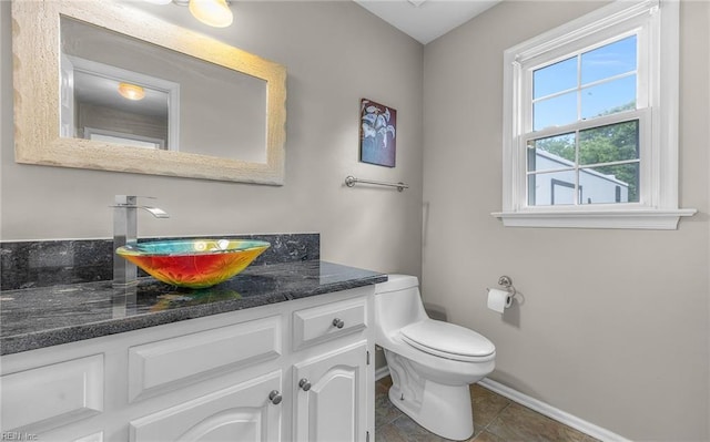 721 Greenwing Dr, Chesapeake, VA 23323 - half bath featuring baseboards, tile patterned flooring, vanity, and toilet