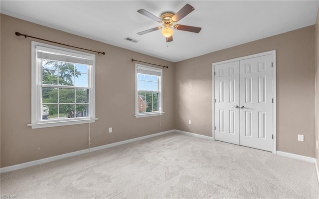 721 Greenwing Dr, Chesapeake, VA 23323 - unfurnished bedroom with visible vents, baseboards, a closet, and light carpet