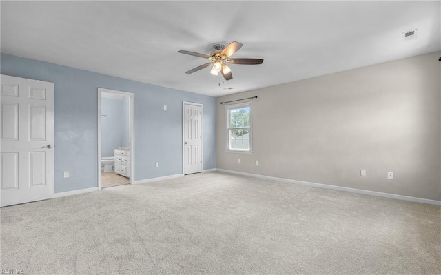 721 Greenwing Dr, Chesapeake, VA 23323 - unfurnished bedroom with baseboards, ensuite bath, visible vents, and light carpet