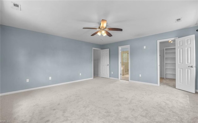 721 Greenwing Dr, Chesapeake, VA 23323 - unfurnished bedroom featuring baseboards, light colored carpet, and a spacious closet