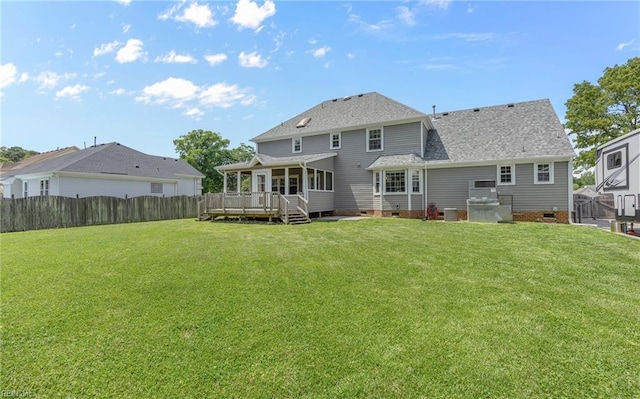 721 Greenwing Dr, Chesapeake, VA 23323 - rear view of property featuring a lawn, fence, crawl space, and a deck