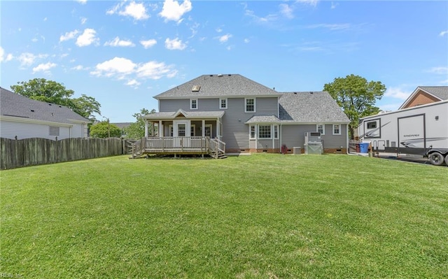 721 Greenwing Dr, Chesapeake, VA 23323 - rear view of property featuring crawl space, a lawn, a deck, a fenced backyard, and a shingled roof