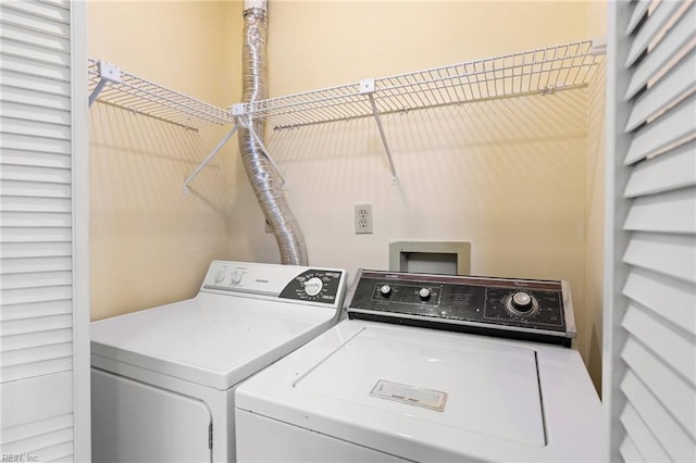 laundry area with washer and clothes dryer