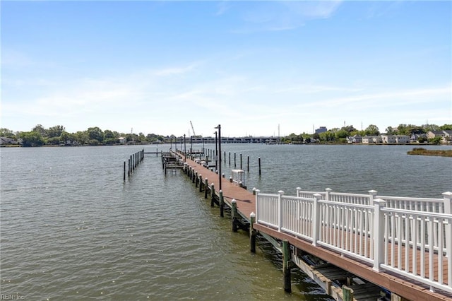dock area featuring a water view