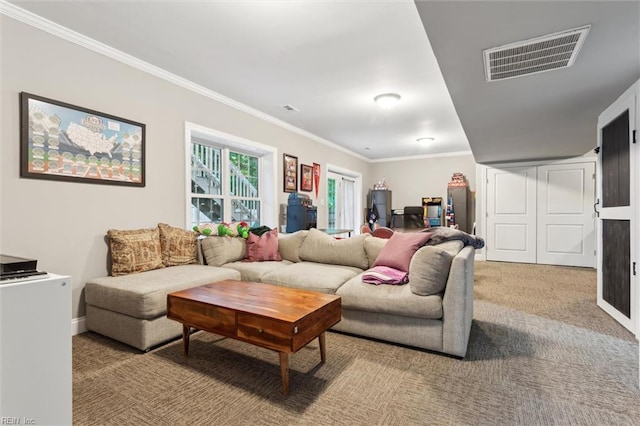 carpeted living room featuring ornamental molding