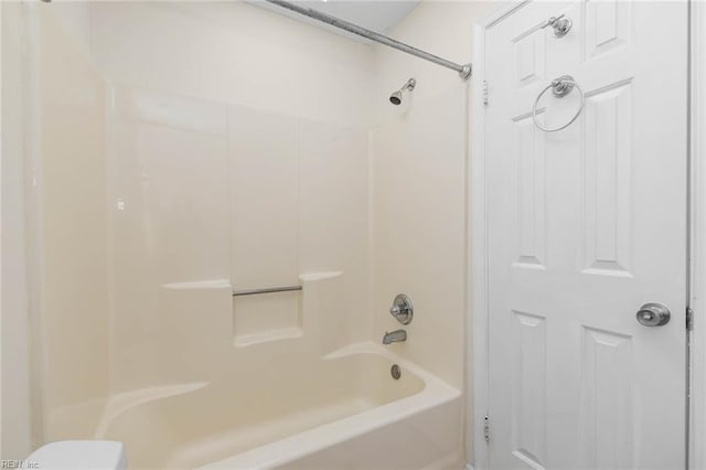 bathroom featuring washtub / shower combination