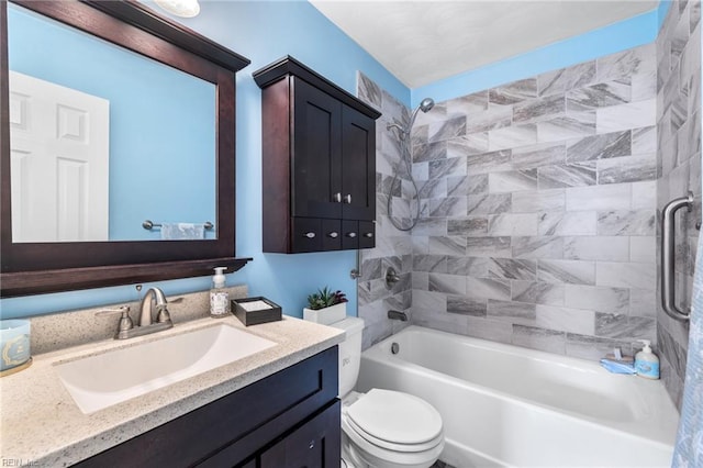 bathroom featuring vanity, shower / bathtub combination, and toilet