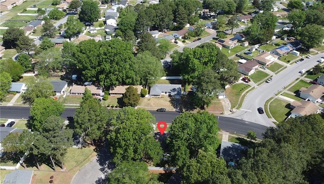 birds eye view of property with a residential view