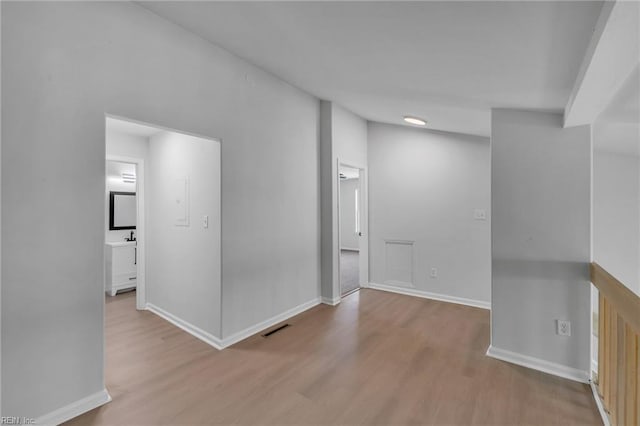 5117 Walkers Grant Ln Unit A, Virginia Beach, VA 23455 - spare room with visible vents, baseboards, and wood finished floors