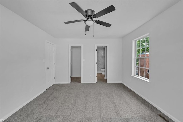 5117 Walkers Grant Ln Unit A, Virginia Beach, VA 23455 - unfurnished bedroom featuring carpet flooring, baseboards, a walk in closet, and connected bathroom