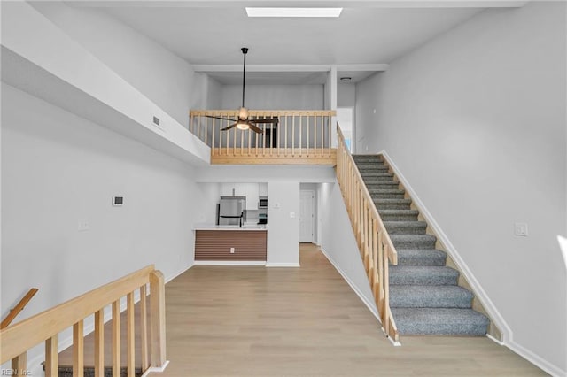 5117 Walkers Grant Ln Unit A, Virginia Beach, VA 23455 - stairway featuring baseboards, a high ceiling, wood finished floors, and visible vents