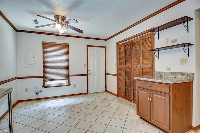 kitchen with baseboards, visible vents, ceiling fan, open shelves, and light countertops