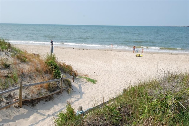 view of water feature with a beach view