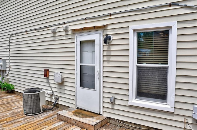 exterior details featuring central air condition unit and electric meter